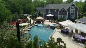 custom waterslide to the pool at a home